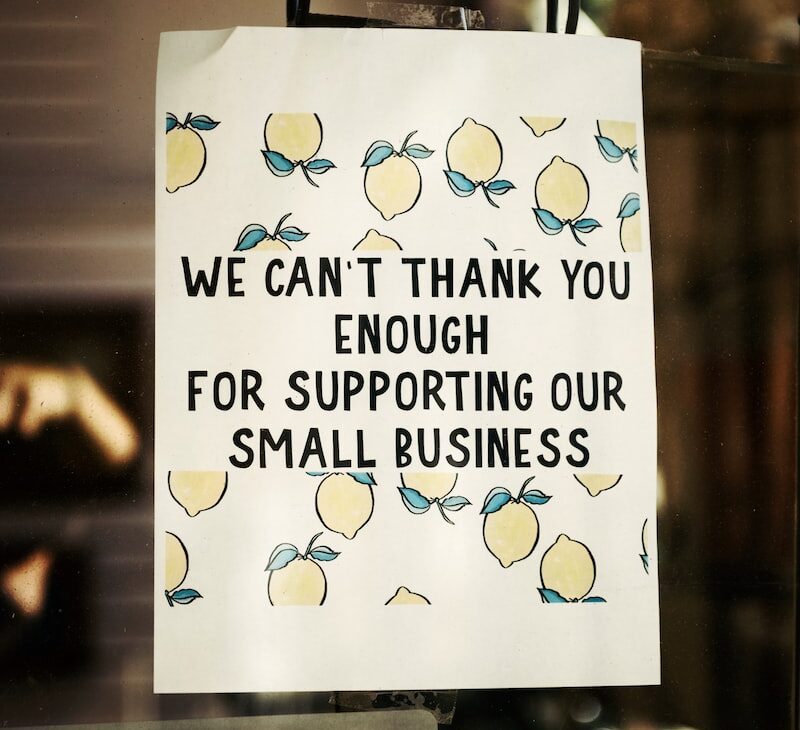 Sign with lemons with text saying: We can't thank you enough for supporting our small business