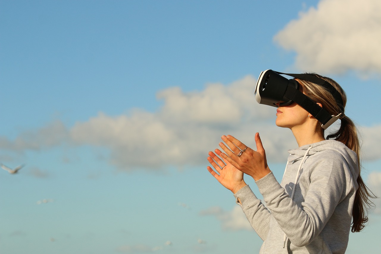 Woman watching virtual reality game